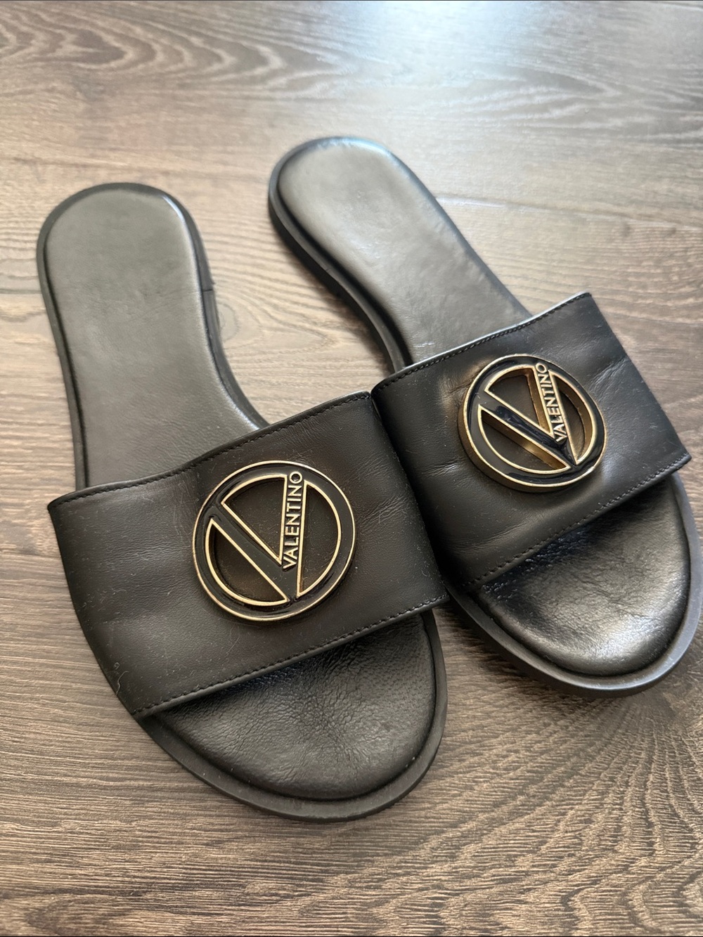 Valentino Black Slide Sandals with Gold Logo Emblem